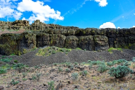 Basalt cliff behind the caves